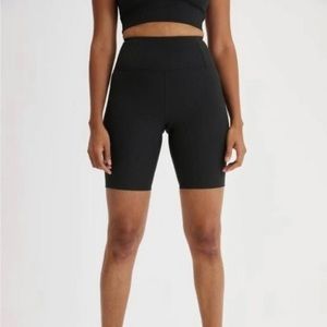 Girlfriend Collective black rib high rise biker shorts, size small